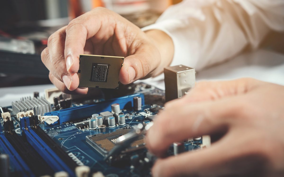 The technician repairing the computer,computer hardware, repairing, upgrade and technology